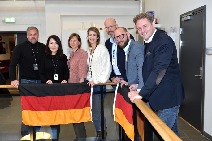 ABAX employees with a german flag